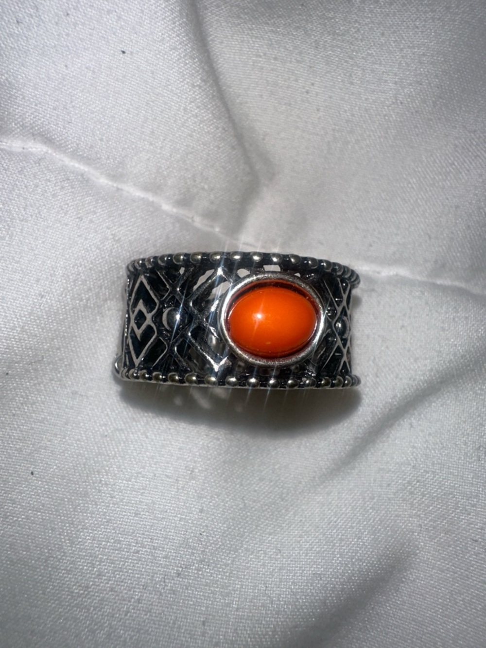 Ornate Silver Band Ring with Bright Orange Cabochon